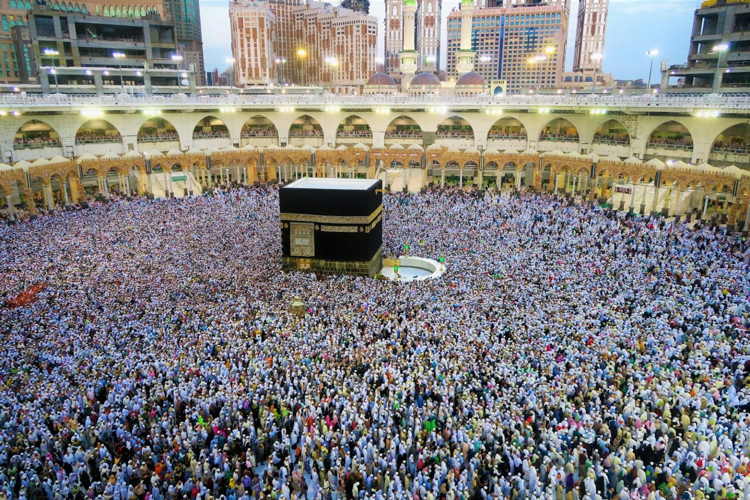 Kakbah Photo by ekrem osmanoglu people sitting on chairs inside building